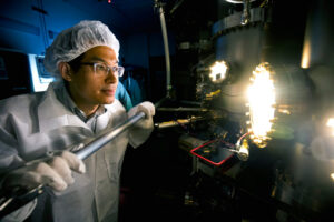 Zetian Mi produces a sample in the molecular beam epitaxy machine. Photo: Joseph Xu/Michigan Engineering
