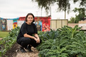 Anya Sirota, an associate professor of architecture at the University of Michigan Taubman College of Architecture and Urban Planning, has been working to help make the Oakland Avenue Urban Farm self-sufficient and sustainable. Credit: Austin Thomason, Michigan Photography